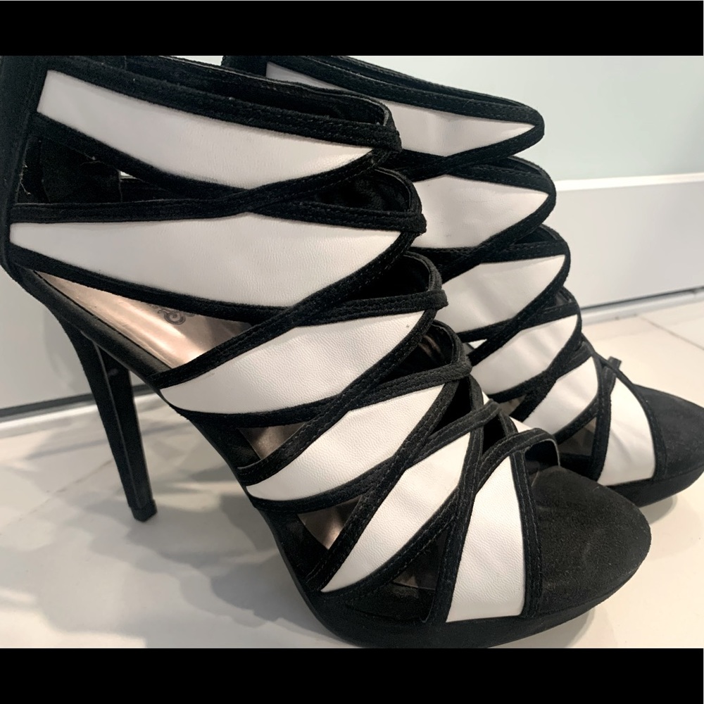 Sexy Carlos Santana black and white heels